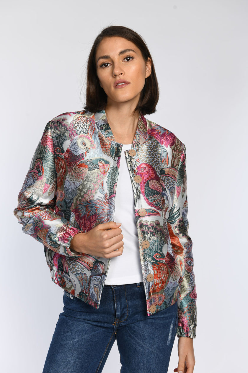 Locker geschnittenes Blouson aus Jacquard mit verdecktem Druckknopfverschluss und elastischen Ärmelbündchen. 