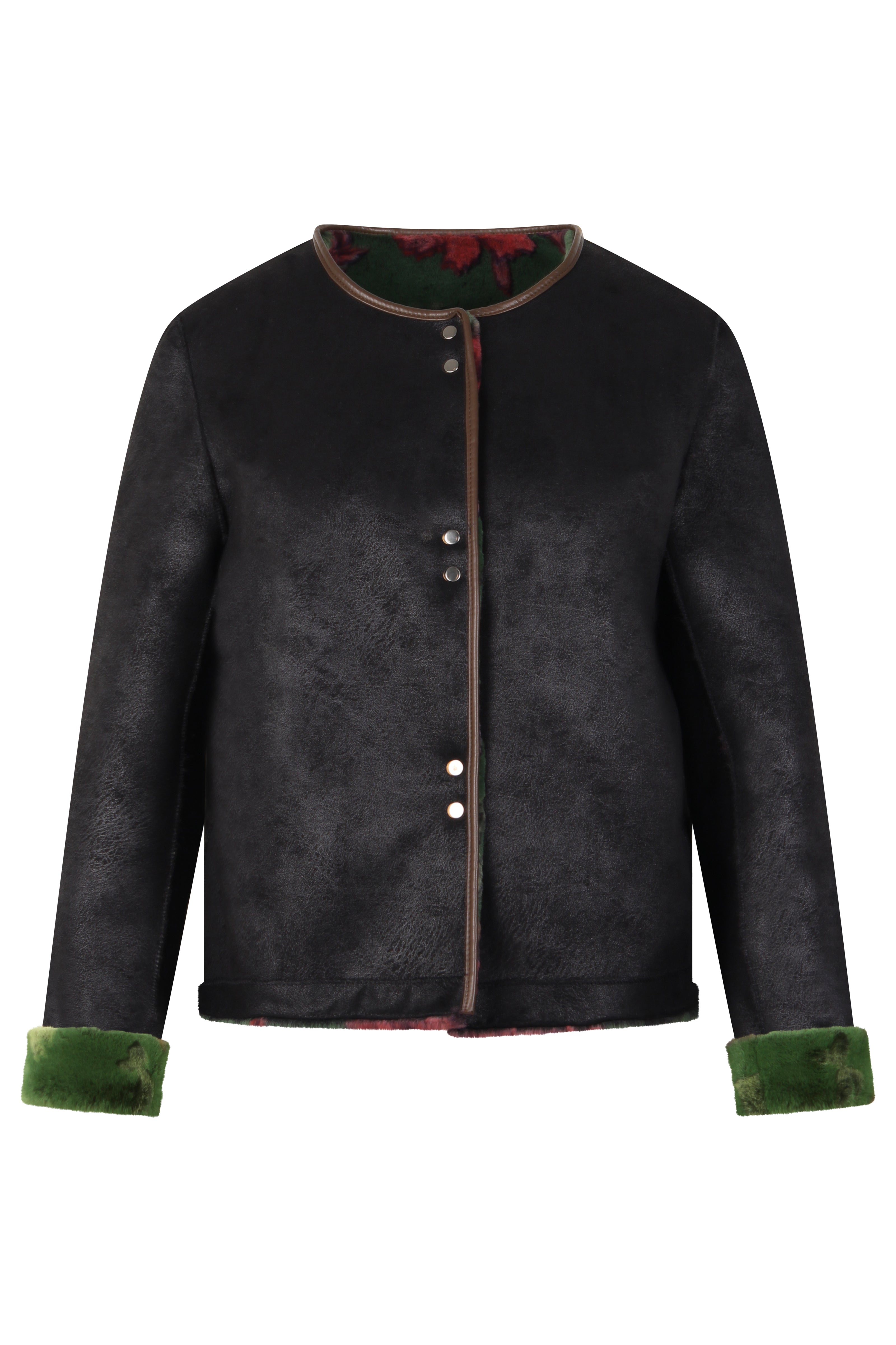 Wendejacke in Schwarz aus Velours mit innenliegendem Webpelz in der Farbe Grün mit flamingo-rosa-farbigem Blütendruck.